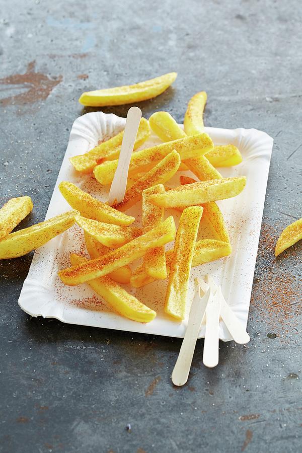 French Fries With Flavoured Salt On A Paper Plate Photograph by Rafael Pranschke