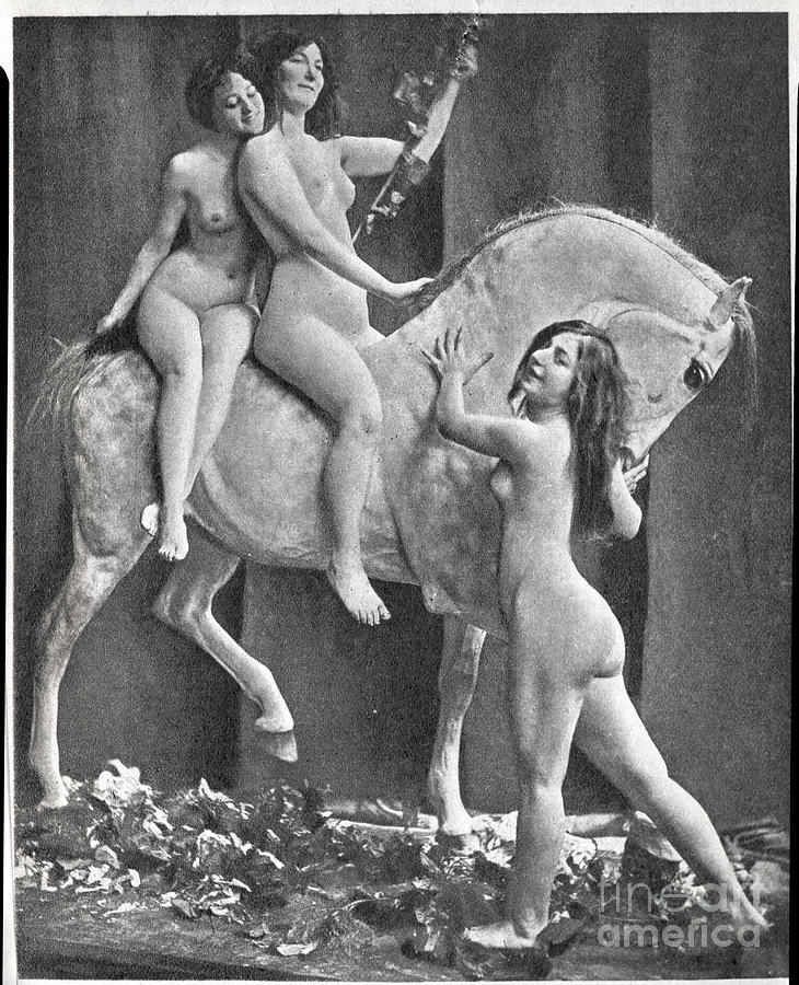 French Models Riding Paper Mache Horse Photograph by Bettmann