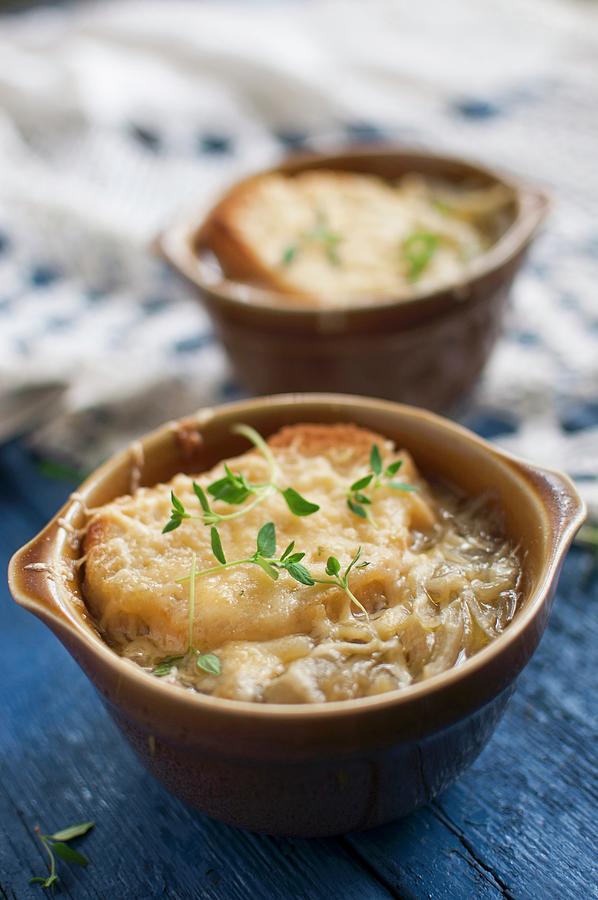 French Onion Soup With Toast, Gruyere Cheese And Fresh Thyme Photograph by Kachel Katarzyna