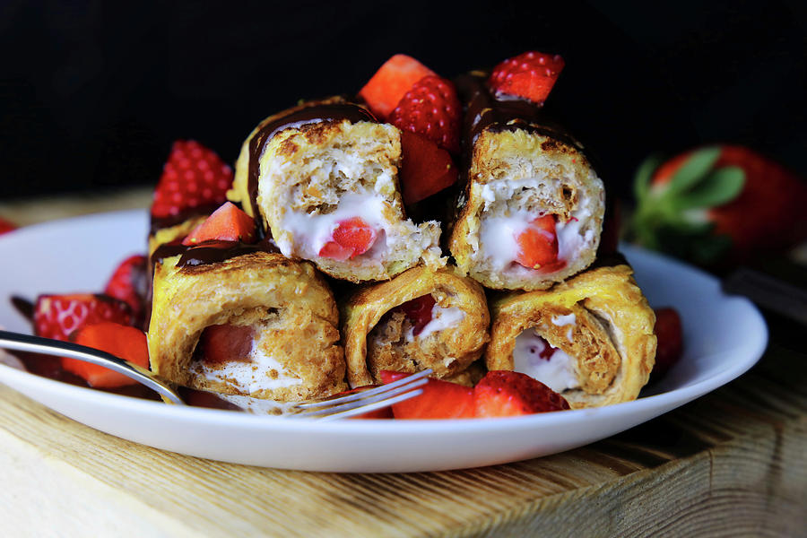 French Toast Rolls Filled With Cream Cheese And Strawberries Photograph by Sarahs Foodphotos