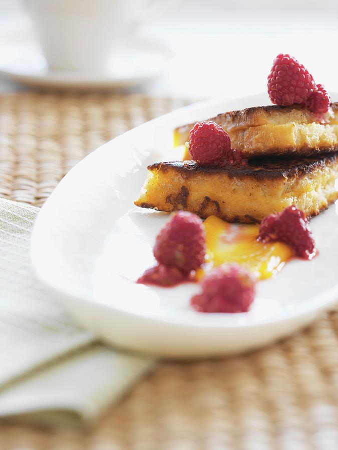 French Toast With Raspberries And Honey Photograph by Martin Dyrlv