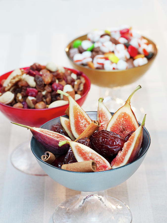 Fresh And Dried Fruits In Bowls Photograph by Johner Images
