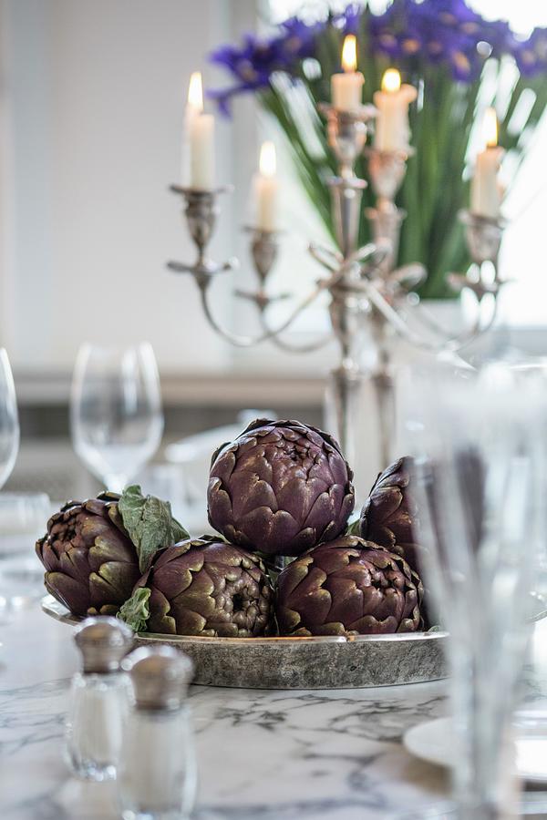 Fresh Artichokes As Table Decoration Photograph by Jan Wischnewski