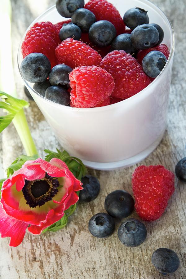 Fresh Berries In A Mug Photograph by Vedder, Catja