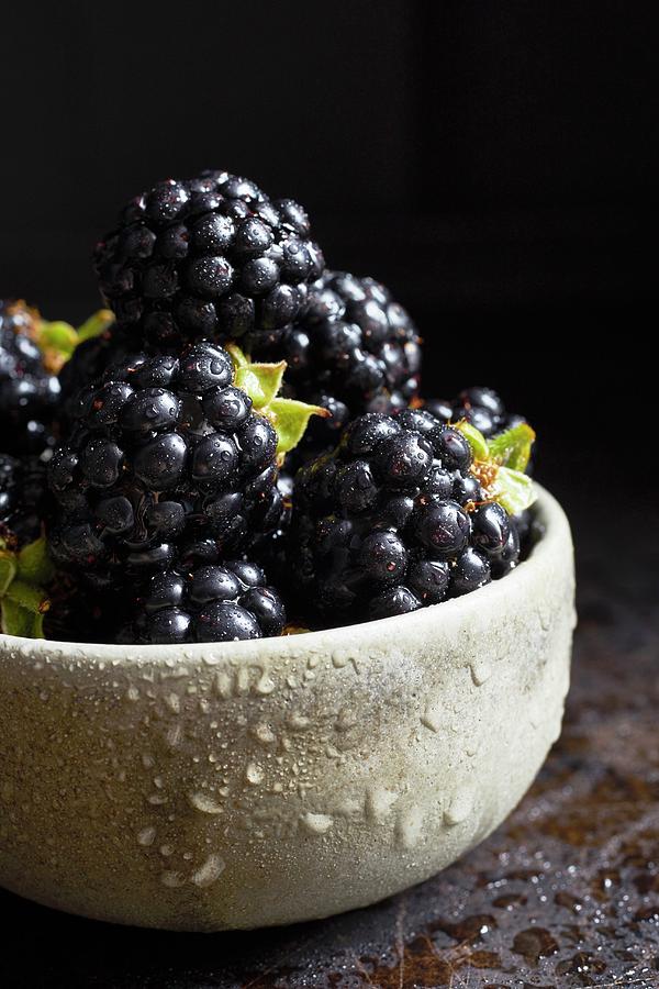 Fresh Blackberries In A Ceramic Bowl Photograph by Ulrike Emmert