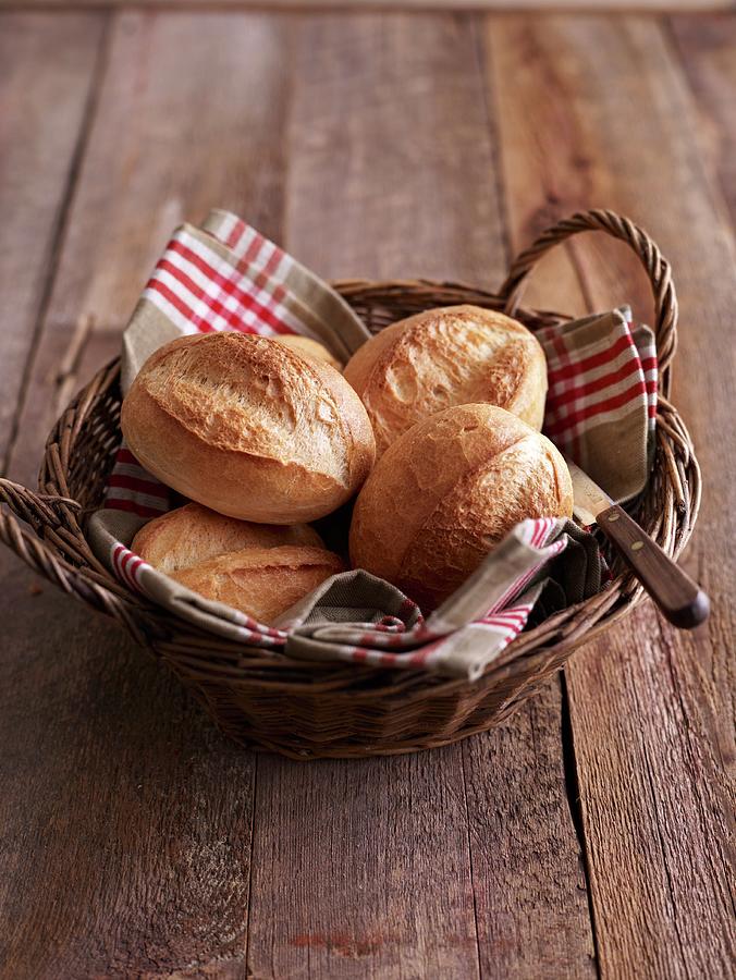Fresh Bread Rolls In A Basket Photograph by Brachat, Oliver