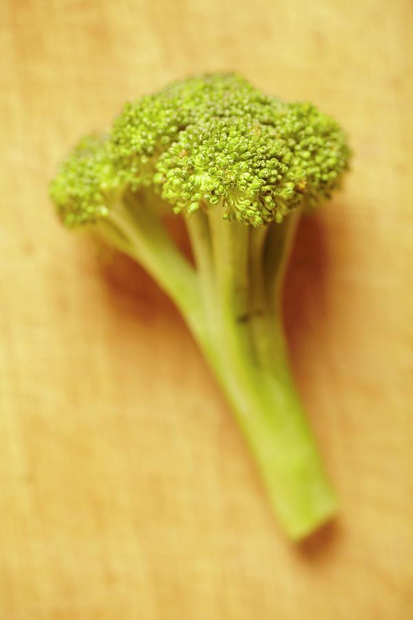 Fresh Broccoli On A Wooden Board Photograph by Brian Yarvin