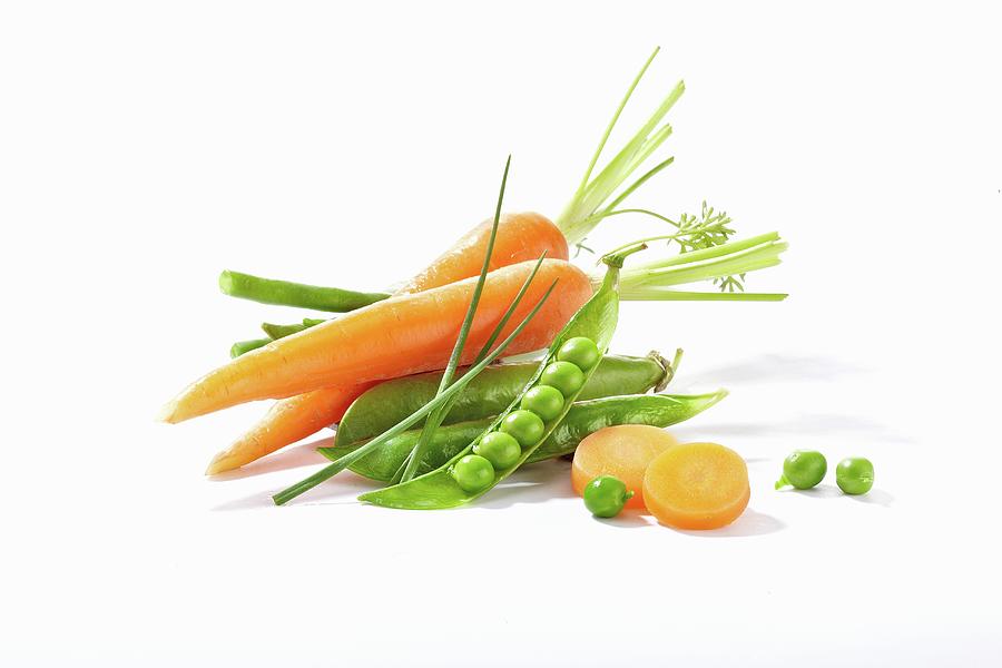 Fresh Carrots, Peas And Chives Photograph by Alessandra Pizzi