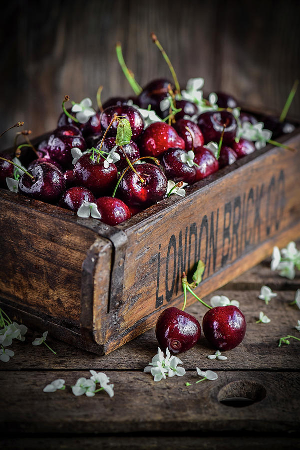 Fresh Cherries In A Wooden Box Photograph by Donna Crous