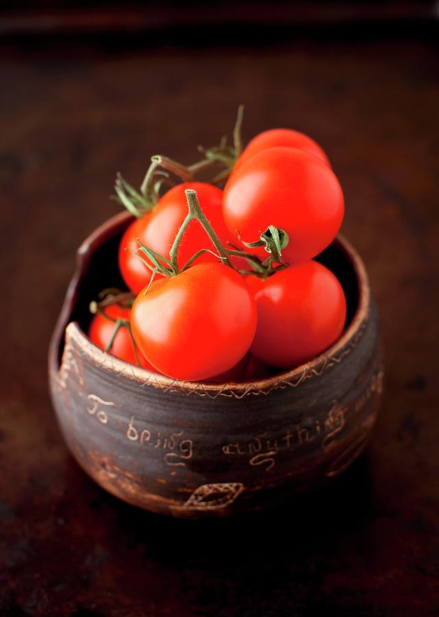 Fresh Cherry Tomatoes In A Small Brown Clay Bowl Photograph by Strokin, Yelena