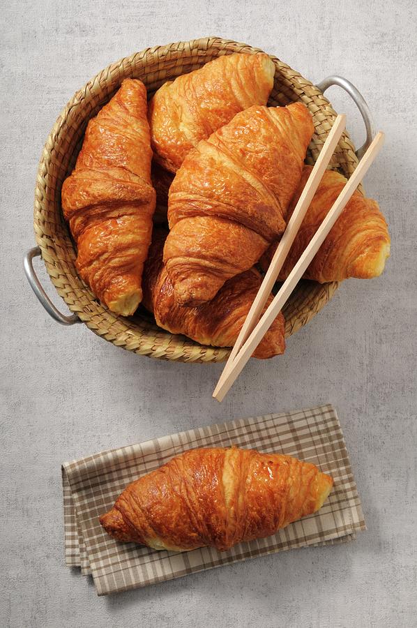 Fresh Croissants In A Basket Photograph by Jean-christophe Riou