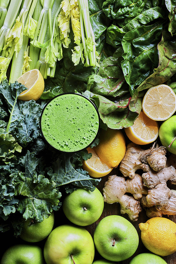 Fresh Detox Juice With Apple, Lemons, Ginger And Green Vegetables Photograph by Fred + Elliott  Photography