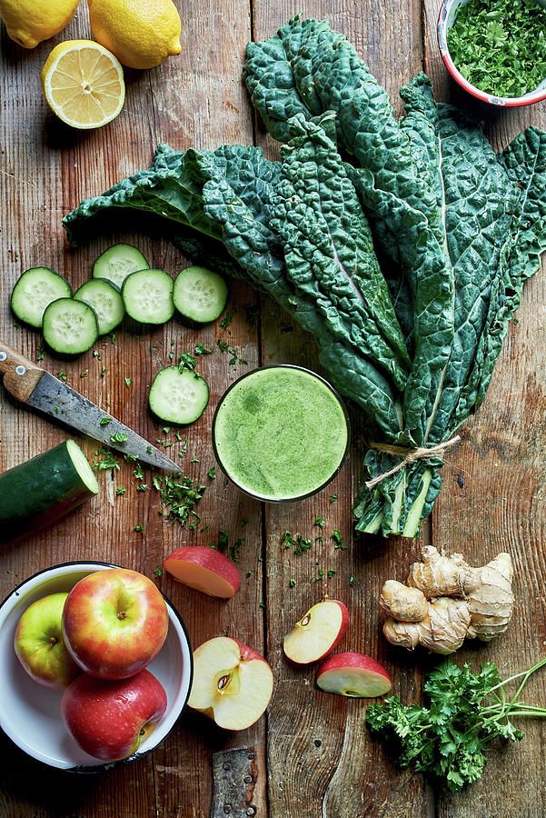 Fresh Detox Juice With Ginger, Lemons, Apple, Cabbage, Cucumber And Chives Photograph by Fred + Elliott  Photography