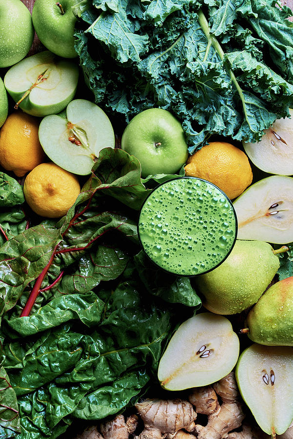 Fresh Detox Juice With Pears, Apple, Lemons, Ginger, Chard And Kale Photograph by Fred + Elliott  Photography