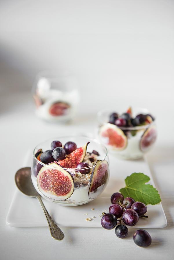 Fresh Figs With Greek Yoghurt, Grapes And Muesli For Breakfast Photograph by Magdalena Hendey