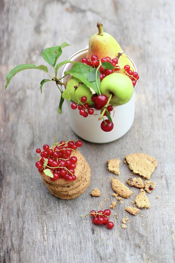 Fresh Fruit In A Cup And A Stack Of Biscuits Photograph by Sylvia E.k Photography
