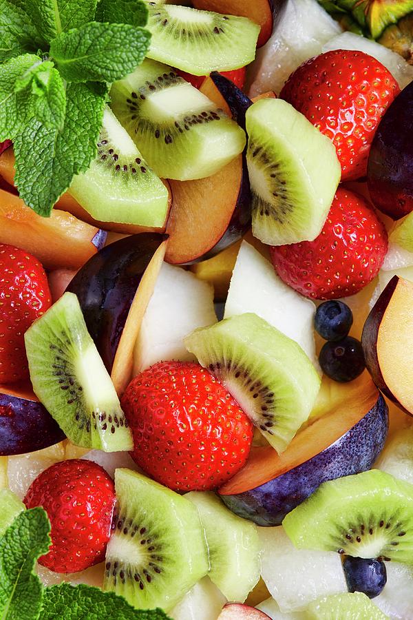 Fresh Fruit Salad With Mint Leaves Photograph by Roberto Rabe