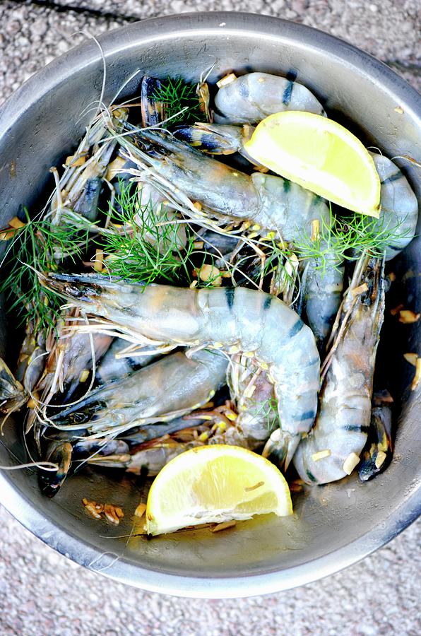 Fresh King Prawns With Lemon Wedges And Fennel Leaves seen From Above Photograph by Jamie Watson