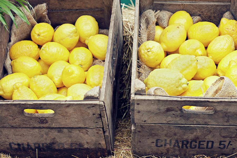 Fresh Lemons In Wooden Crates Photograph by Kirstie Young