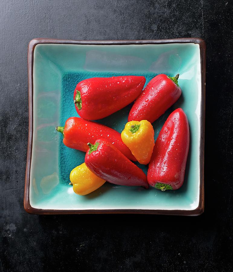 Fresh Mini Peppers In A Turquoise Bowl Photograph by Ludger Rose