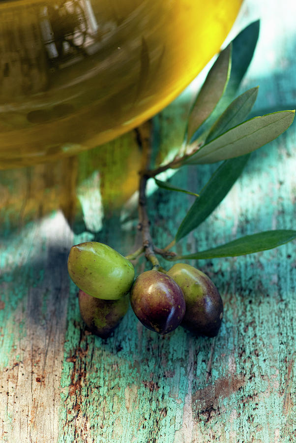 Fresh Olive Oil With Olives Photograph by Spyros Bourboulis