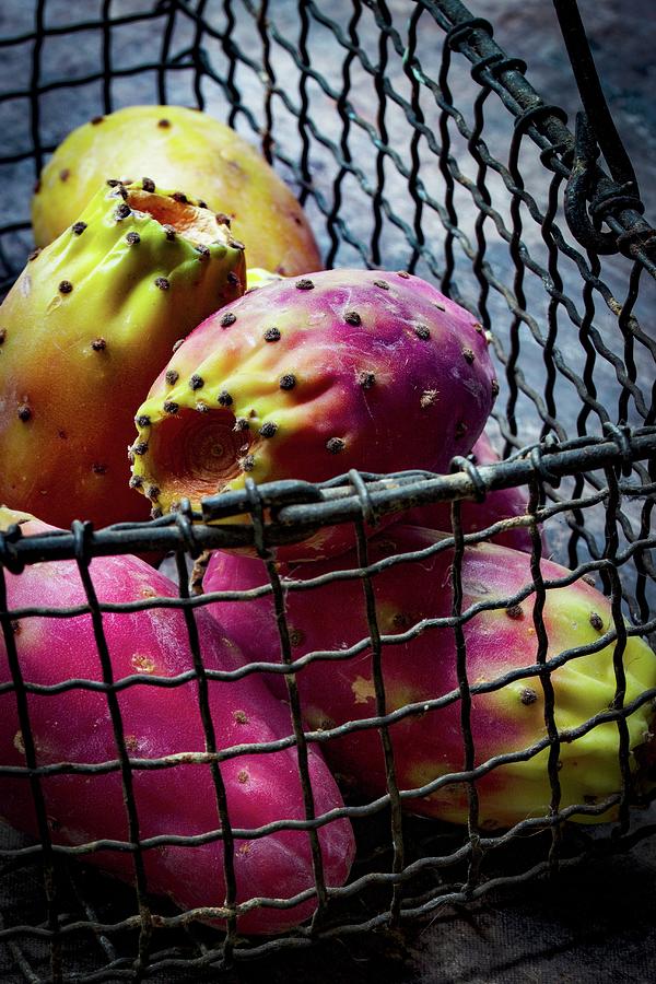 Fresh Prickly Pears In A Wire Basket Photograph by Charlotte Von Elm
