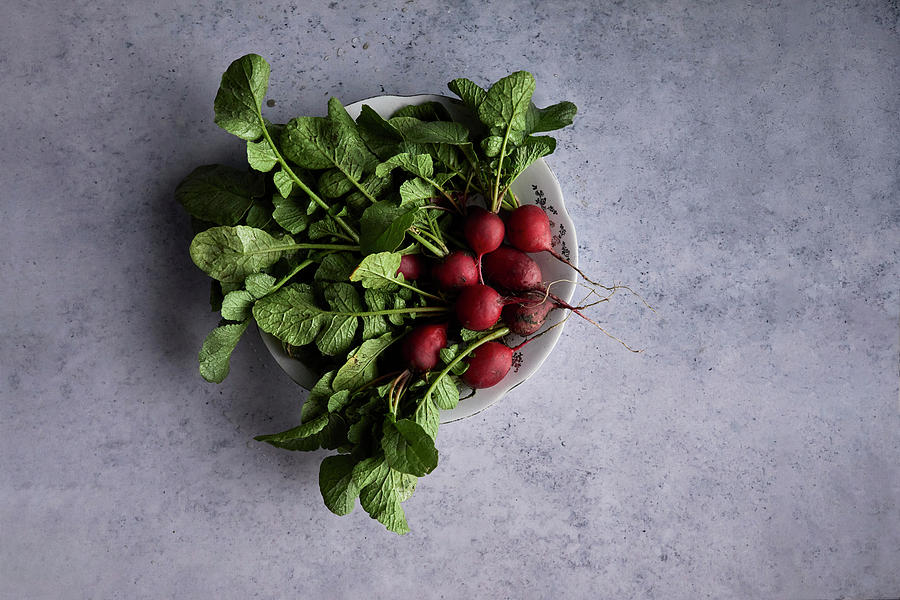Fresh Radishes In A Bowl On A Gray Background Photograph by Natasa Dangubic