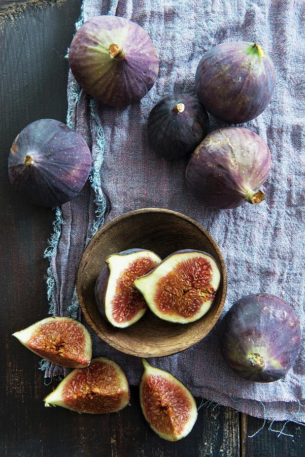 Fresh Red Figs, Whole, Halved And Quartered Photograph by Veronika ...