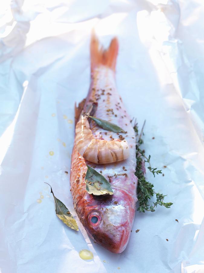 Fresh Red Mullet And Prawns With Herbs Photograph by Joerg Lehmann
