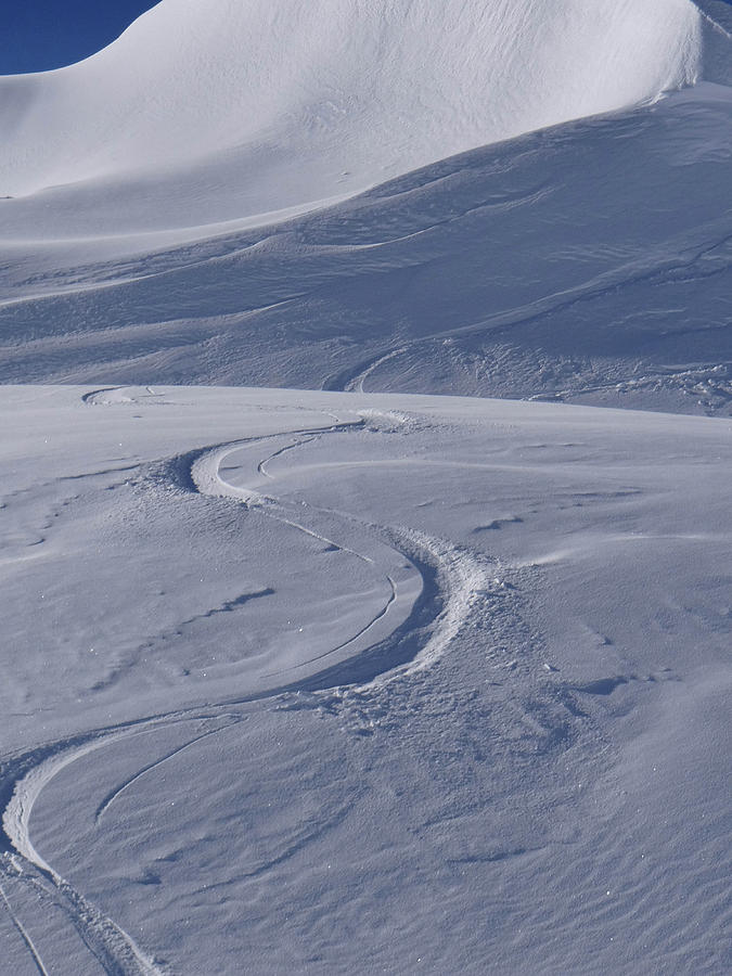 Fresh ski tracks from the Col du Fornet  Photograph by Steve Estvanik