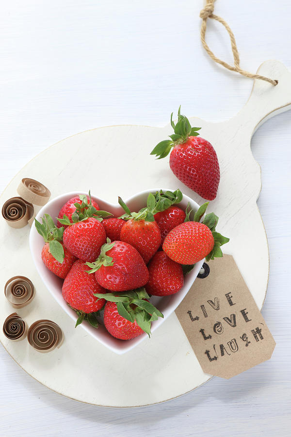 Fresh Strawberries In A Heart Bowl With A Message, On A White Board Photograph by Regina Hippel
