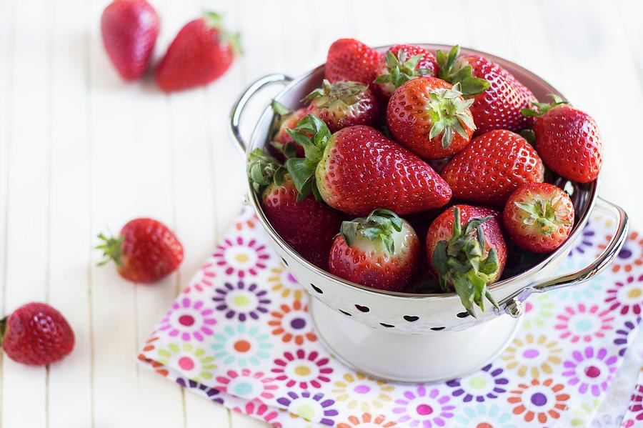 Fresh Strawberries In An Enamel Colander Photograph by Vernica Orti