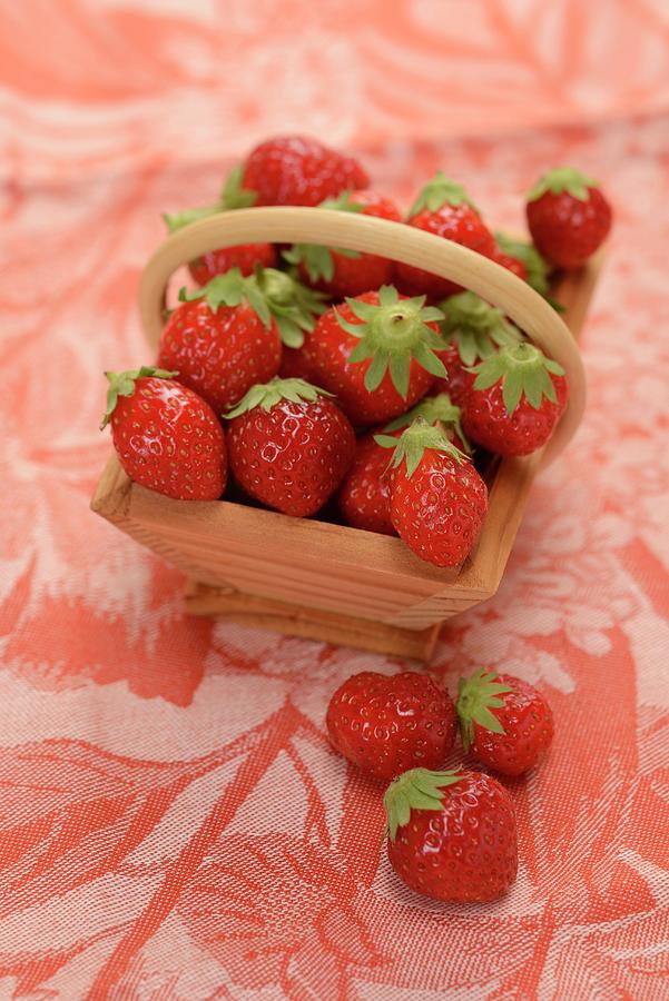Fresh Strawberries In Trug Photograph by Alain Caste