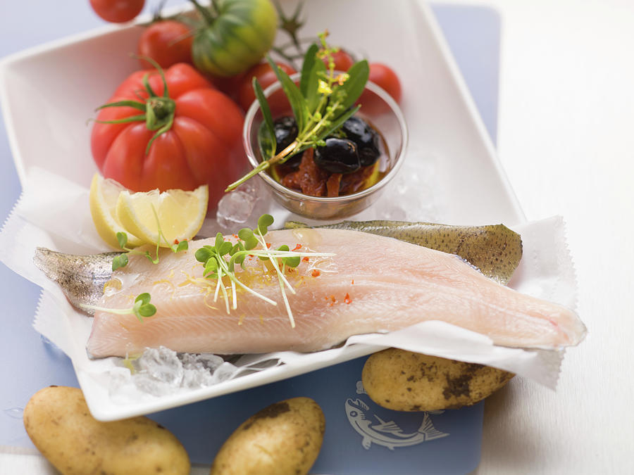 Fresh Trout Fillets With Potatoes, Tomatoes And Olives Photograph by Eising Studio
