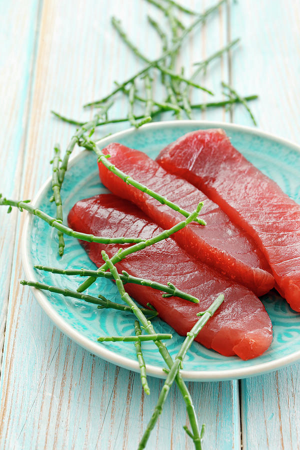 Fresh Tuna Fish Steaks And Saltwort On A Plate Photograph by Petr Gross