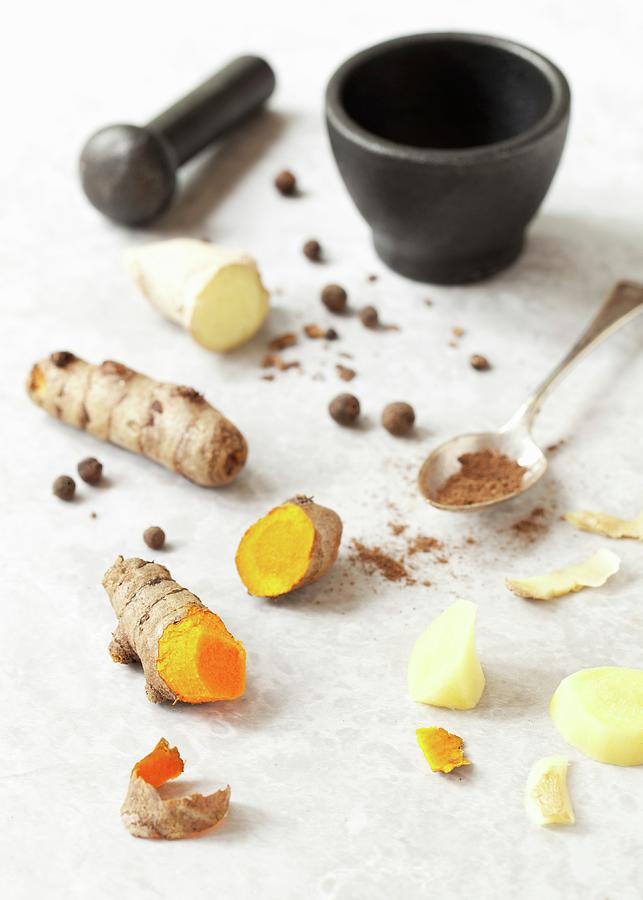 Fresh Turmeric Root, Ginger Root And Allspice Photograph by Jane Saunders