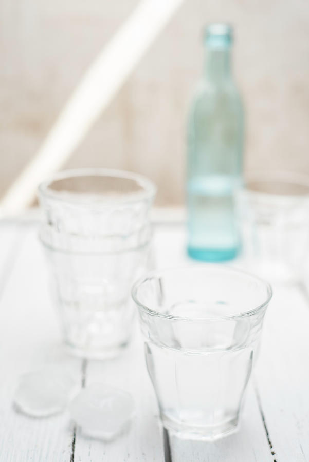 Fresh Water In A Glass With Ice Cubes Photograph by Canan Czemmel
