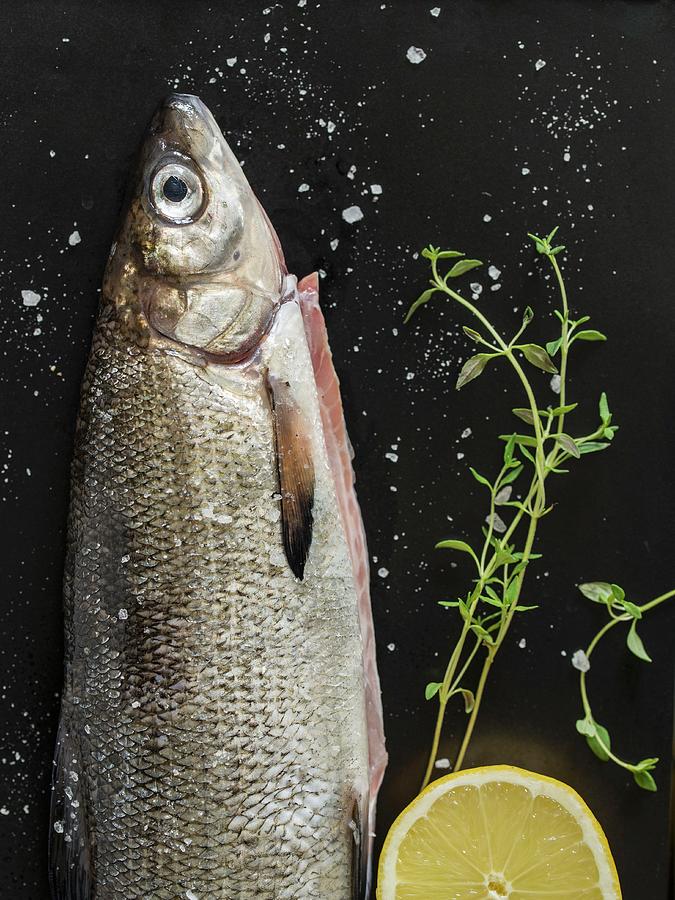 Fresh Whiting With Lemon And Thyme Photograph by Antti Jokinen