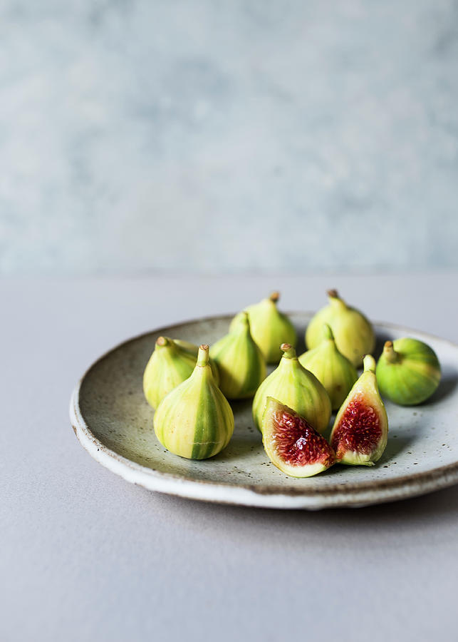 Fresh Yellow Tiger Figs On A Dish Photograph by Lisa Rees
