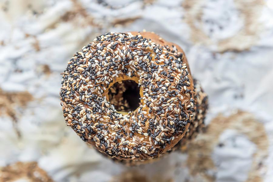 Freshly Baked Bagel With Healthy Seeds On The Top Photograph by Ltummy