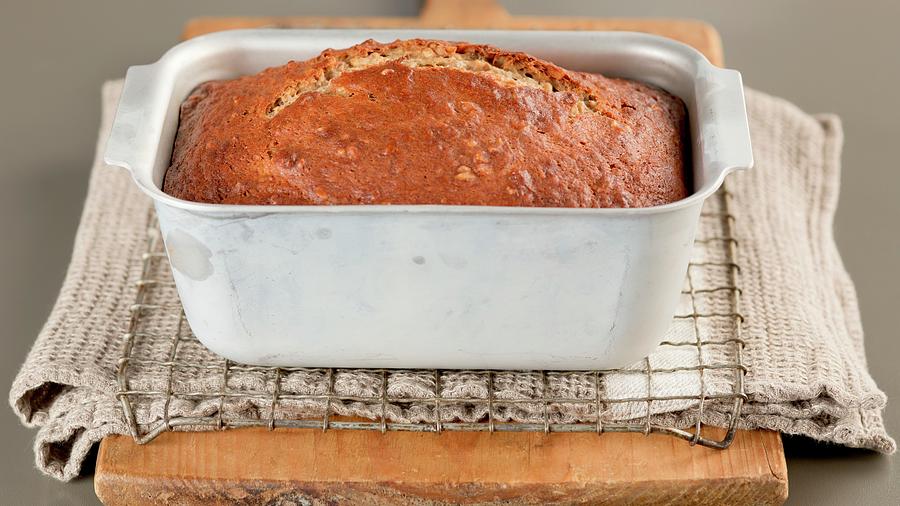 Fruit Photograph - Freshly Baked Banana Bread In A Loaf Tin by Eising Studio - Food Photo & Video