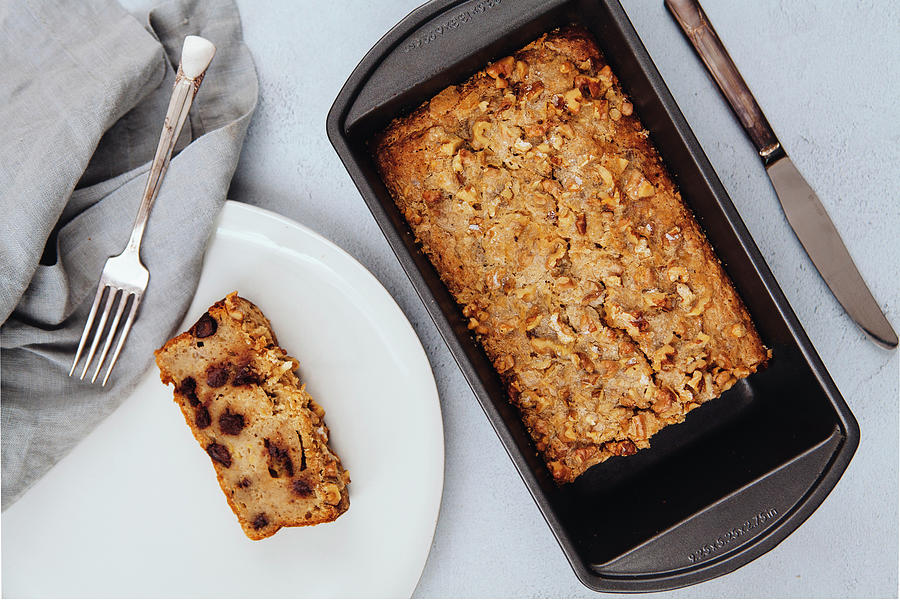 Freshly Baked Chocolate Chip Banana Bread Loaf Topped With Walnuts Photograph by Theresa Scarbrough
