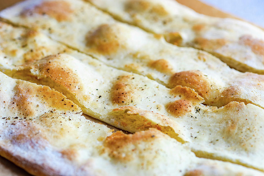 Freshly Baked Italian Focaccia Cut Into Strips close Up Photograph by Anna Bogush