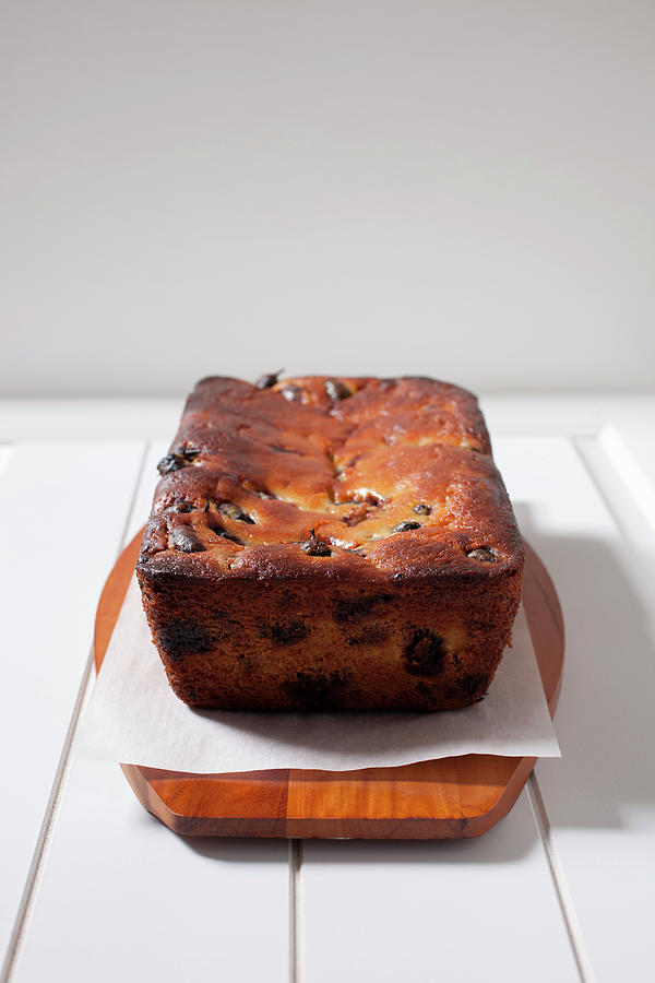 Freshly Baked Mulberry Bread On Cutting Board Photograph by Katharine Pollak