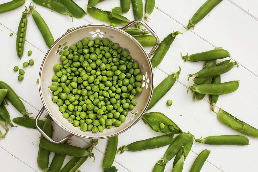 Freshly Shelled Peas In A Colander Photograph by Jane Saunders
