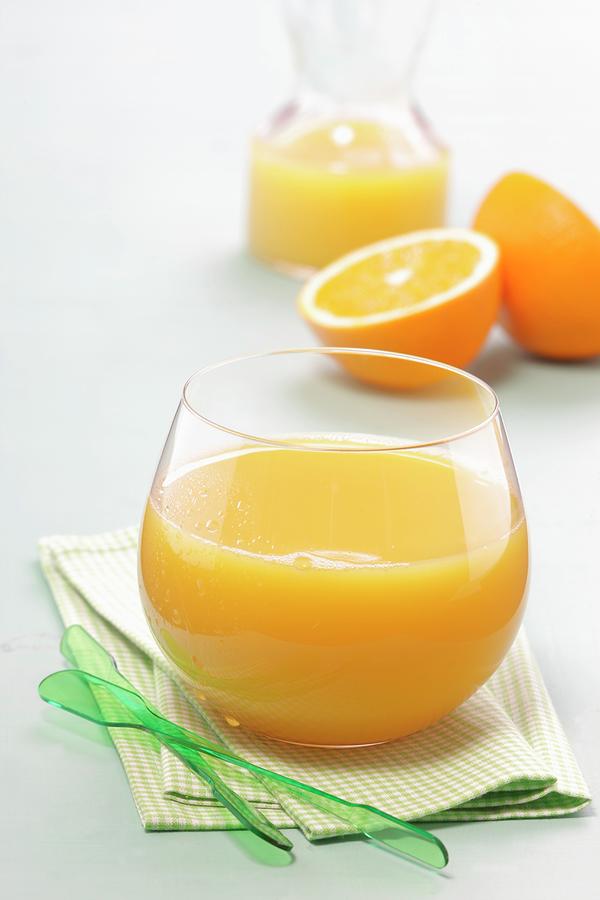 Freshly Squeezed Orange Juice Photograph by Bender, Uwe