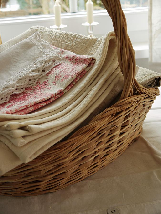 Freshly-washed Linen In Basket Photograph by Erika Reetz