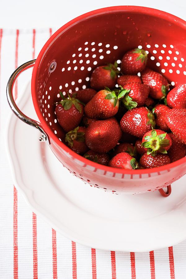 Freshly Washed Strawberries In A Colander Photograph by Anna Grudzinska-sarna