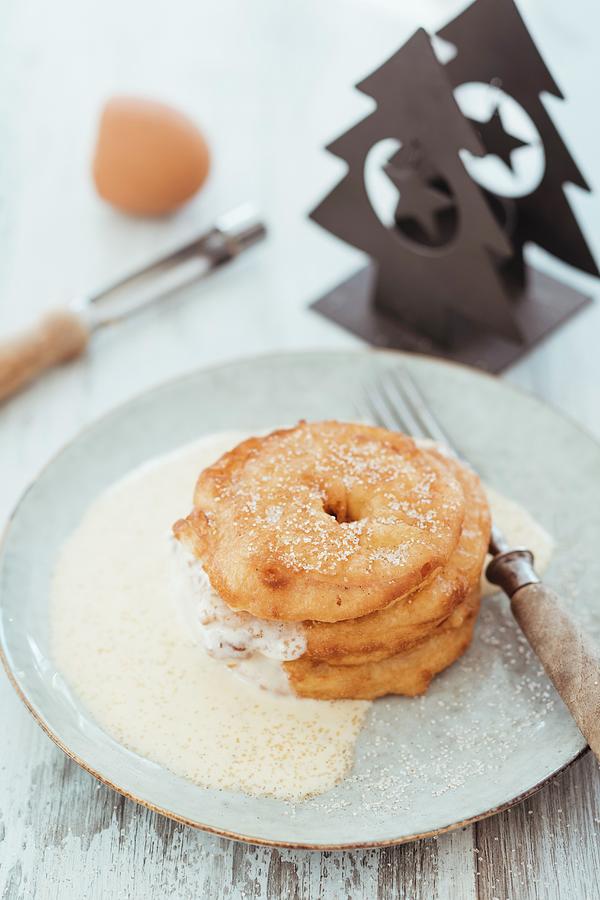 Fried Apple Rings With Vanilla Sauce For Christmas Photograph by Jan Wischnewski