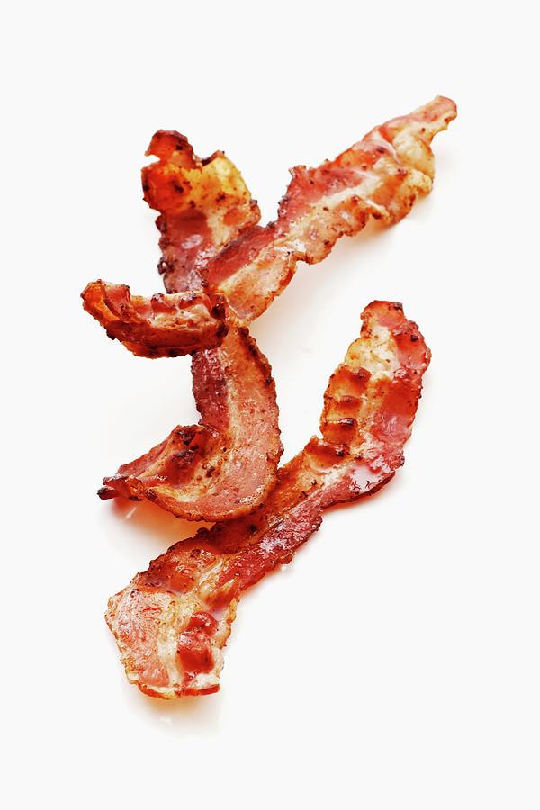Fried Bacon Pieces Photograph by Petr Gross